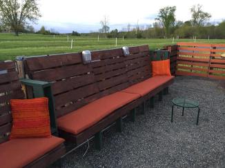 Pallet seating finished with stain, custom cushions, new retro spealers that are wired for sound. (Click on pic to take you to the Drive-in)